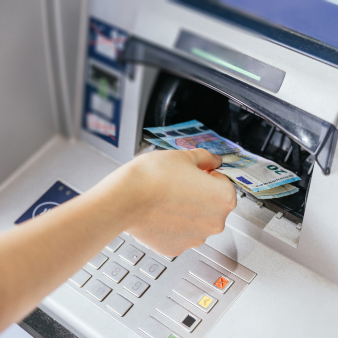 Depositing money in atm top